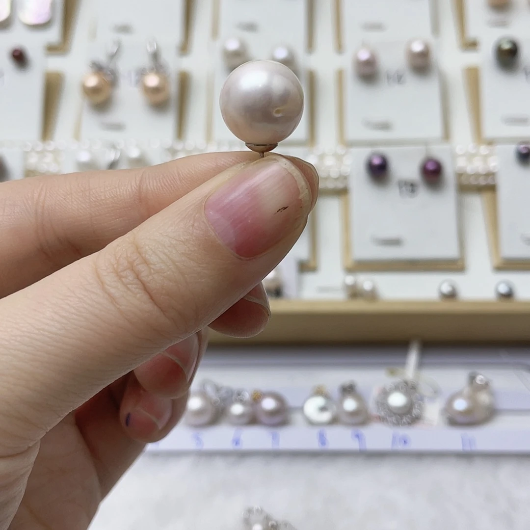 岱***青淡水珍珠银S925镶嵌耳饰