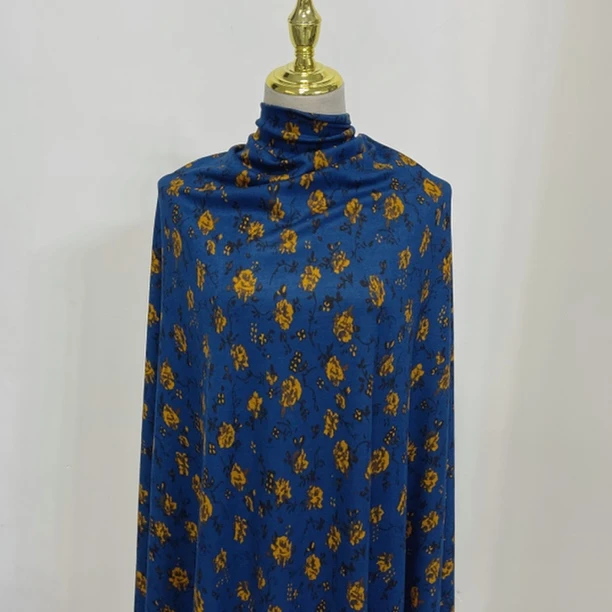 貂绒棉布料蓝底小黄花