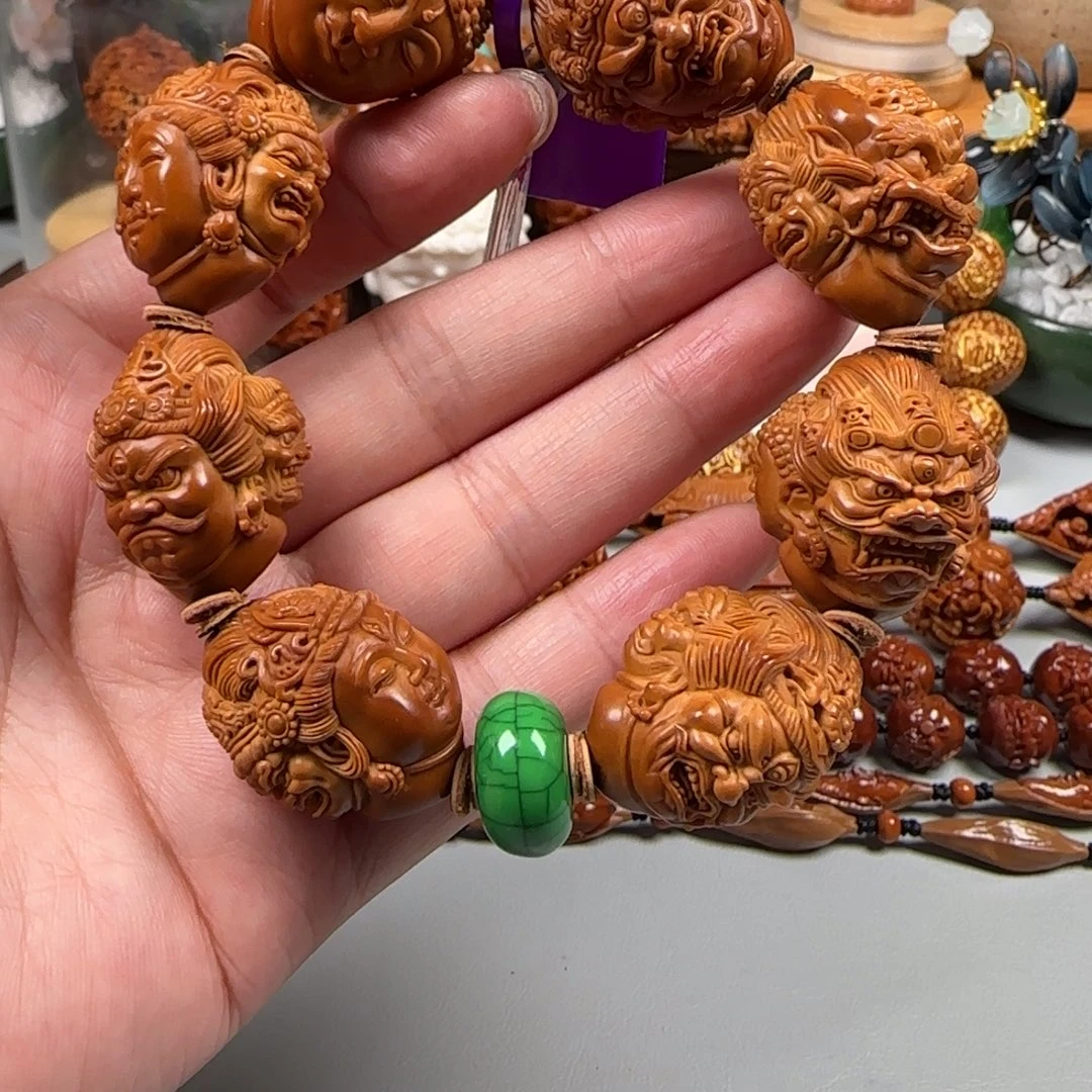 手串/手链橄榄核宽2.3梅林红核三面万佛朝宗