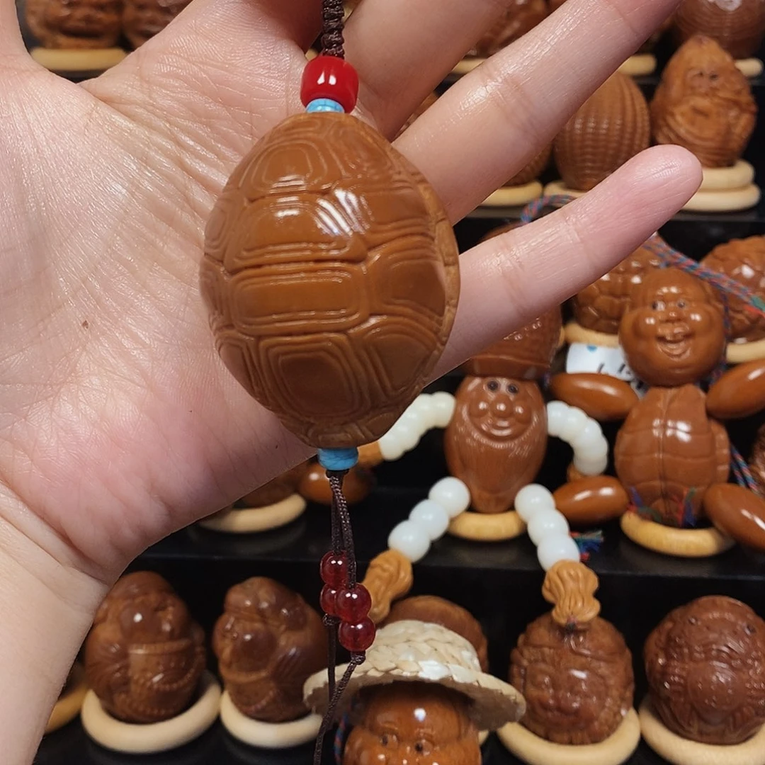 橄榄核吊坠富甲单颗000088