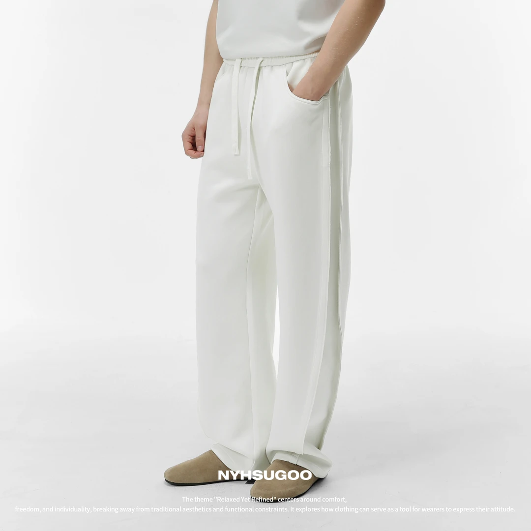 NYHSUGOO/南乙3486春季新品男士弯刀微阔休闲裤设计款抽绳卫裤