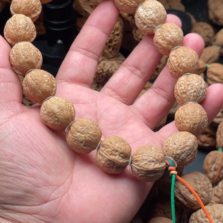 文玩核桃吊坠核****对19铁元宝