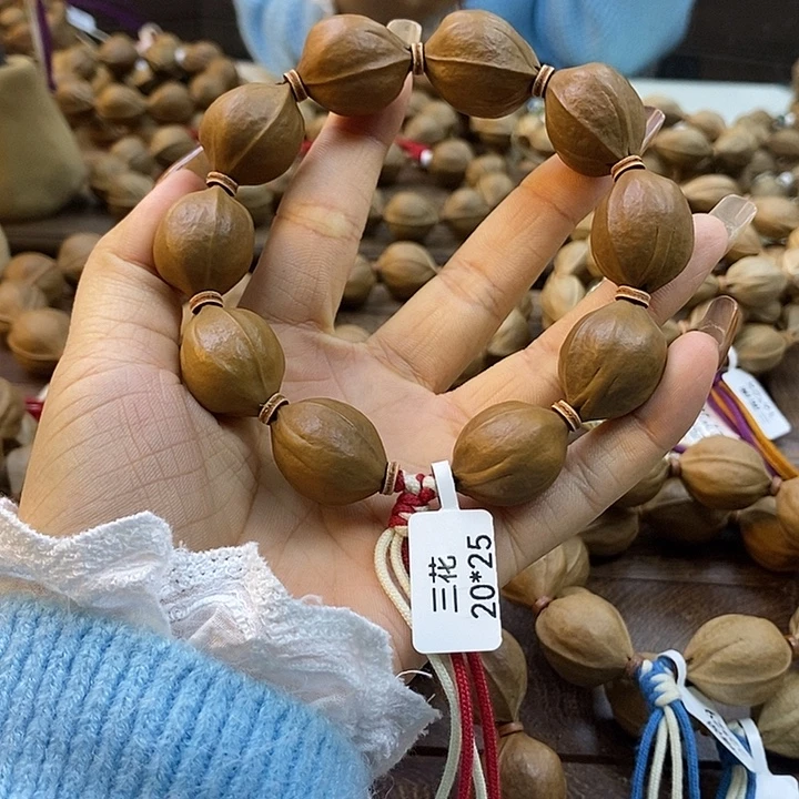 卖***李橄榄核吊坠梅林铁核