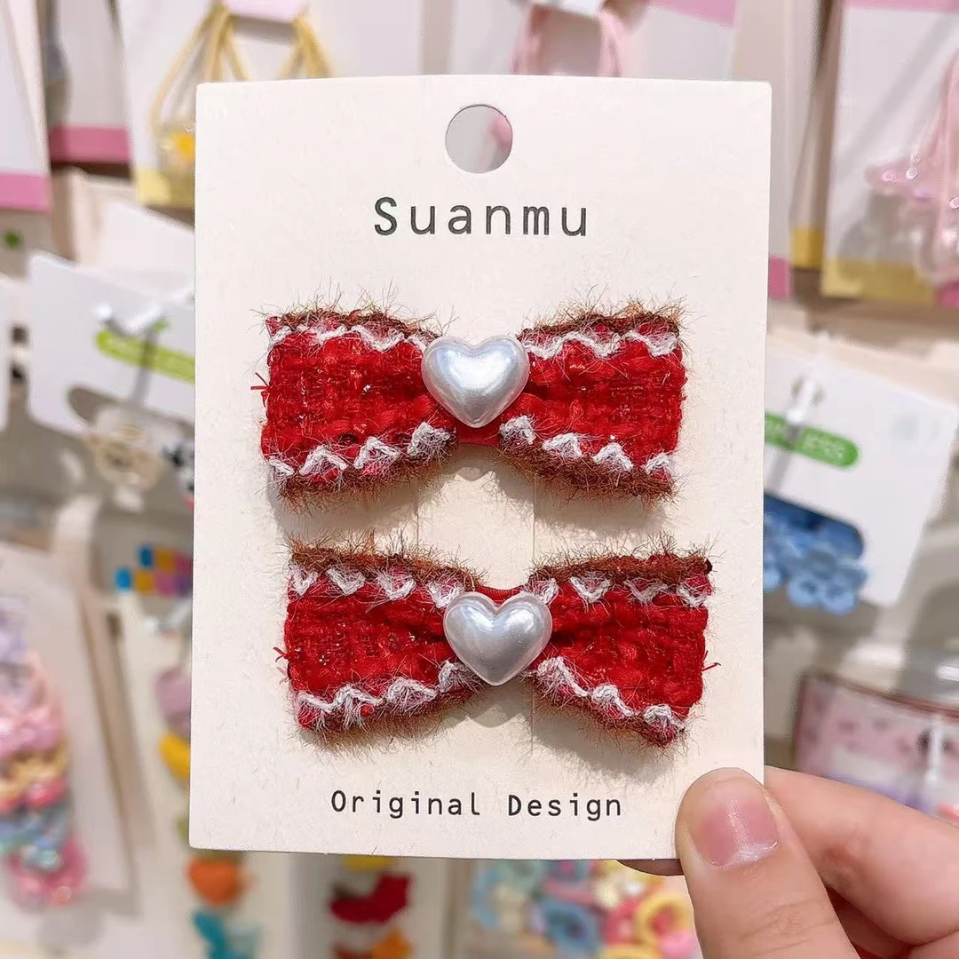 B-1786（满10米飞）mm 1对红色蝴蝶结爱心鸭嘴夹  发圈