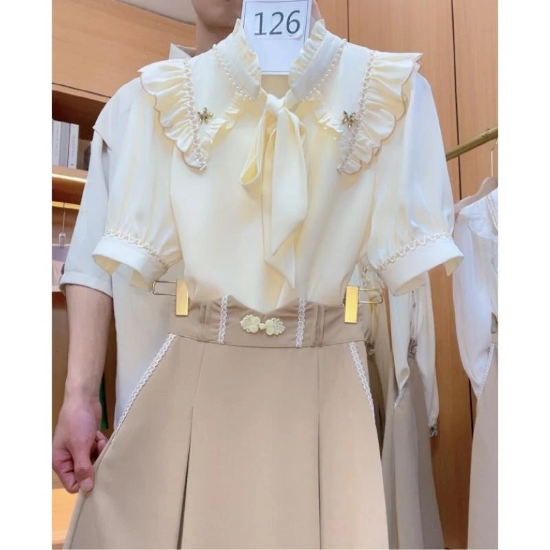 2025年夏季新款高级感荷叶边衬衫套装女气质显瘦半身裙两件套女夏