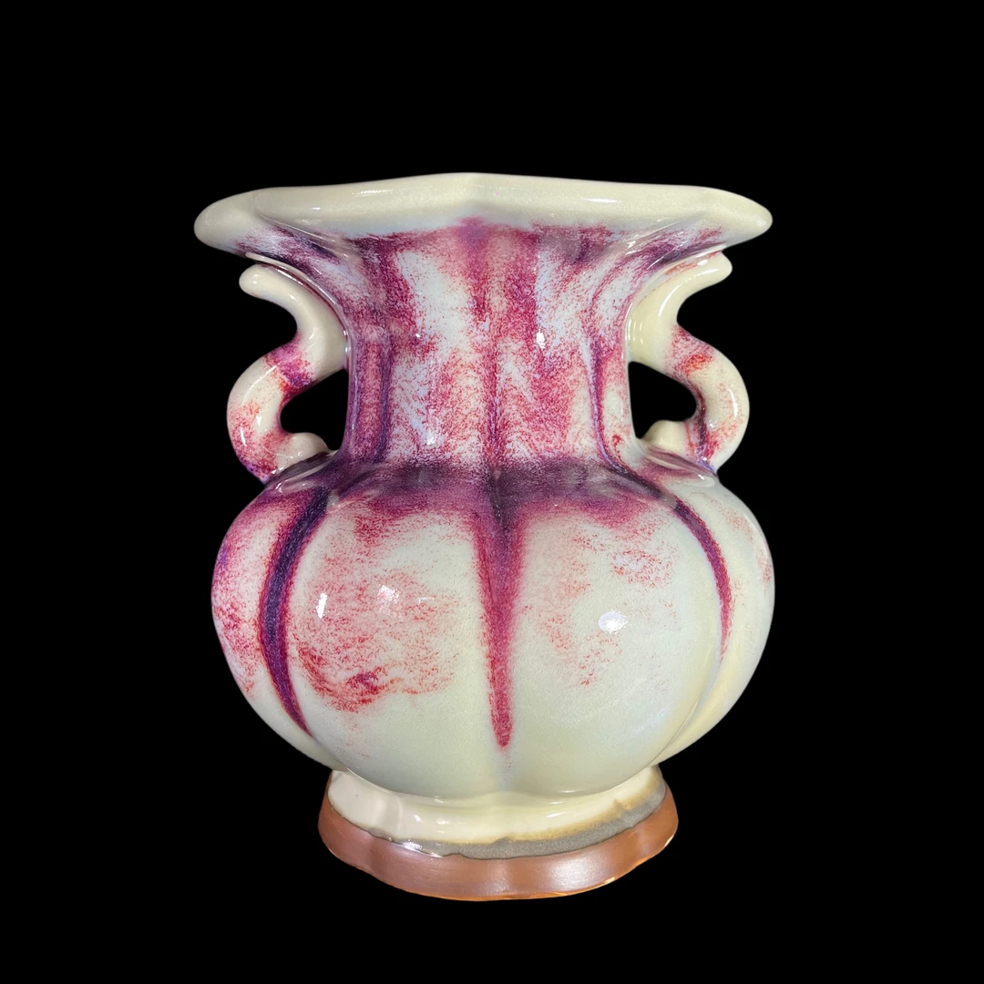 文建伍老师传统煤烧作品———葵花尊。