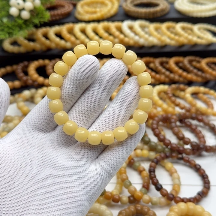 手串菩提根/象牙果10*11精工 鼓珠 10年