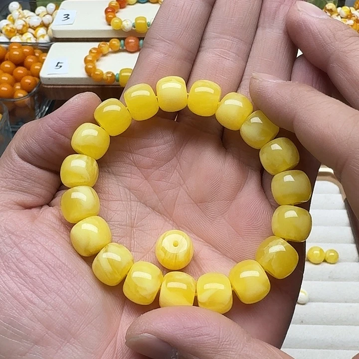 浩***熔非金属鸡油黄色桶珠一条搭配