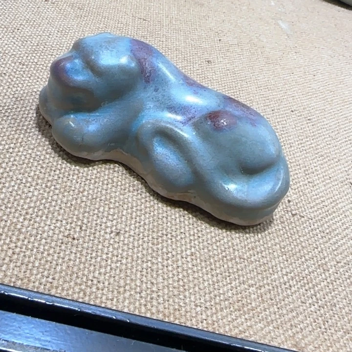 盱****瓷片小兽。
