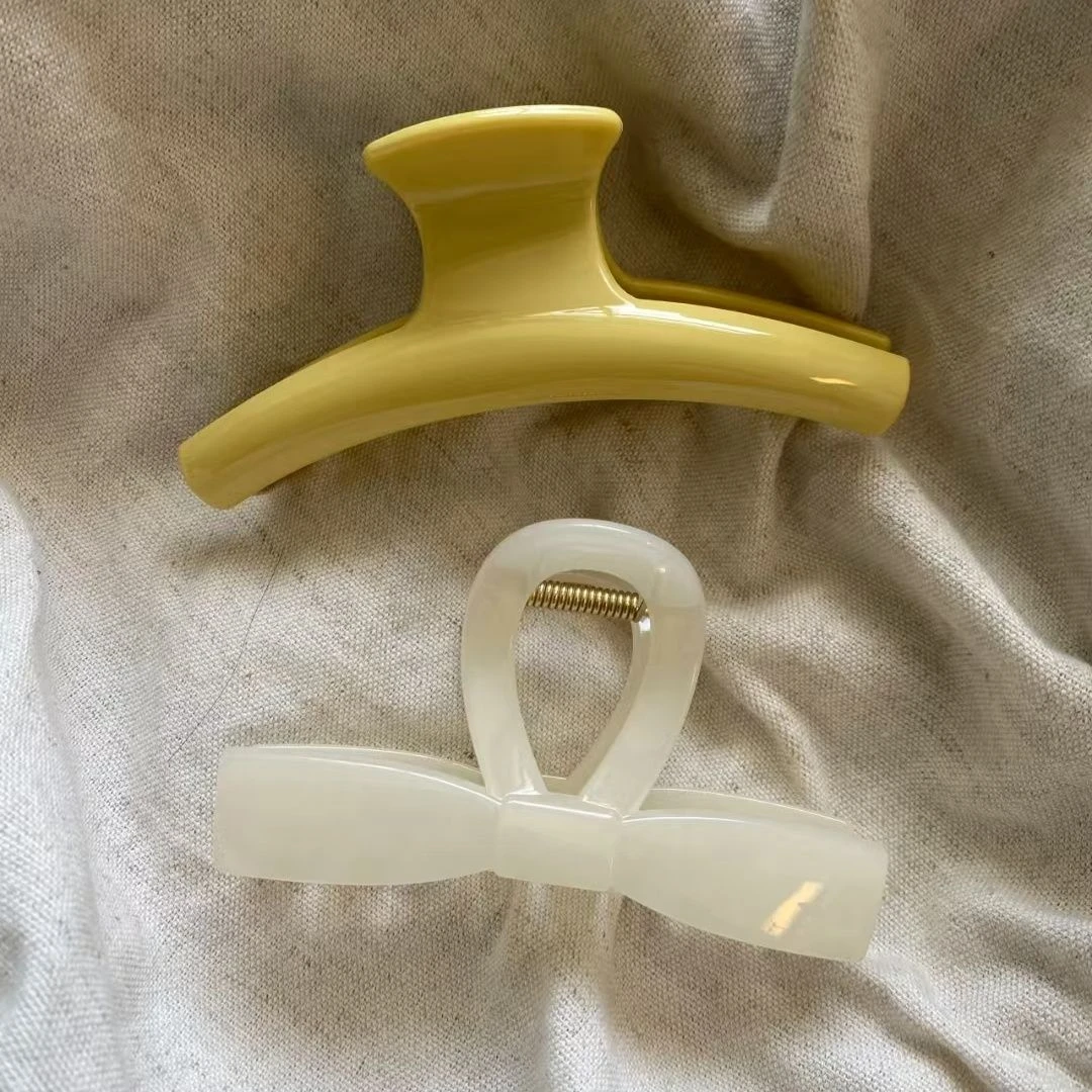 2025新款鹅黄弧形白玉领结清新百搭款发饰法式ins风抓夹鲨鱼夹