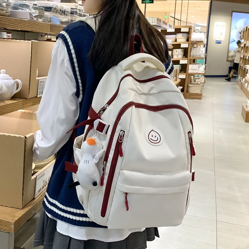 卡拉羊书包女初中生中学生简约双肩包男生高中大学生大容量韩版电