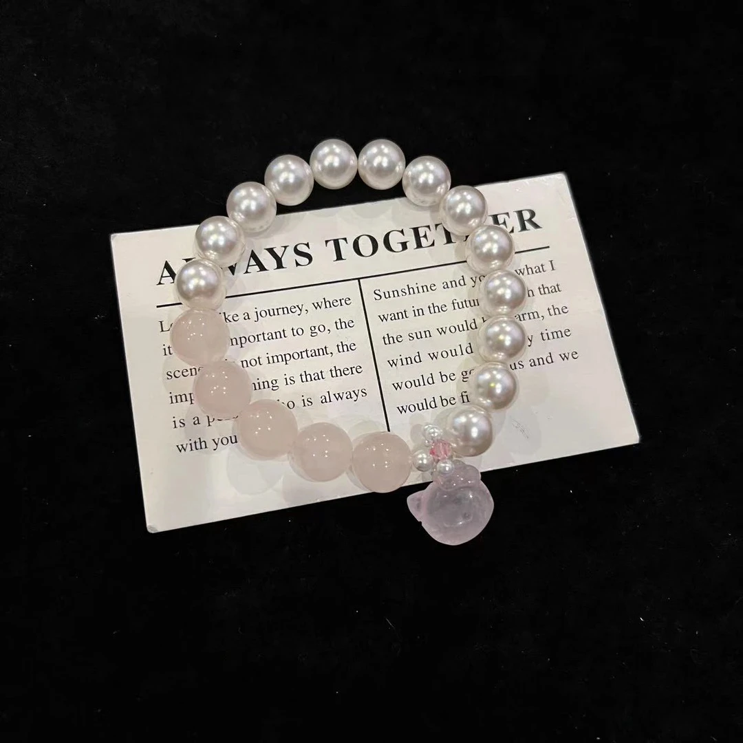 F622 西柚粉拼接贝珠+kt猫设计款手串 多样性发一