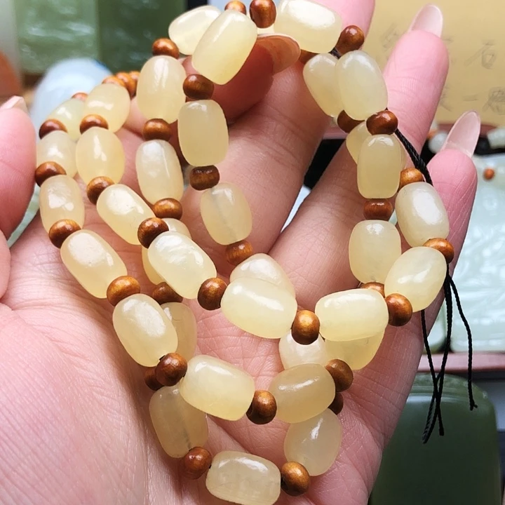 栾*天然玉石黄珠链