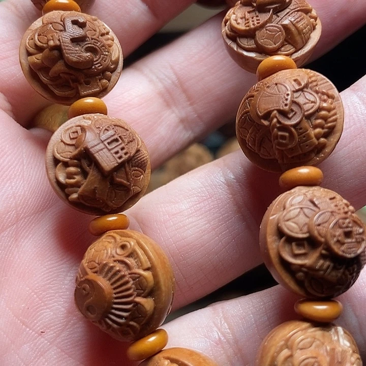 龙纹桃核法器多宝