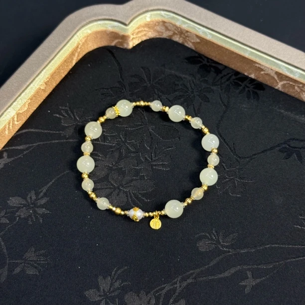 【晚香玉】天然和田玉蜂蜜水猫眼冰透银珠手串L507