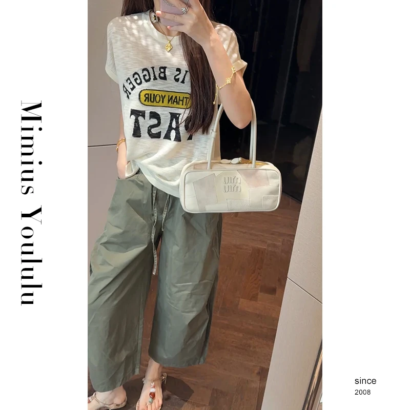 【mimius】U 韩系设计感不规则侧扣字母上衣 WG05069