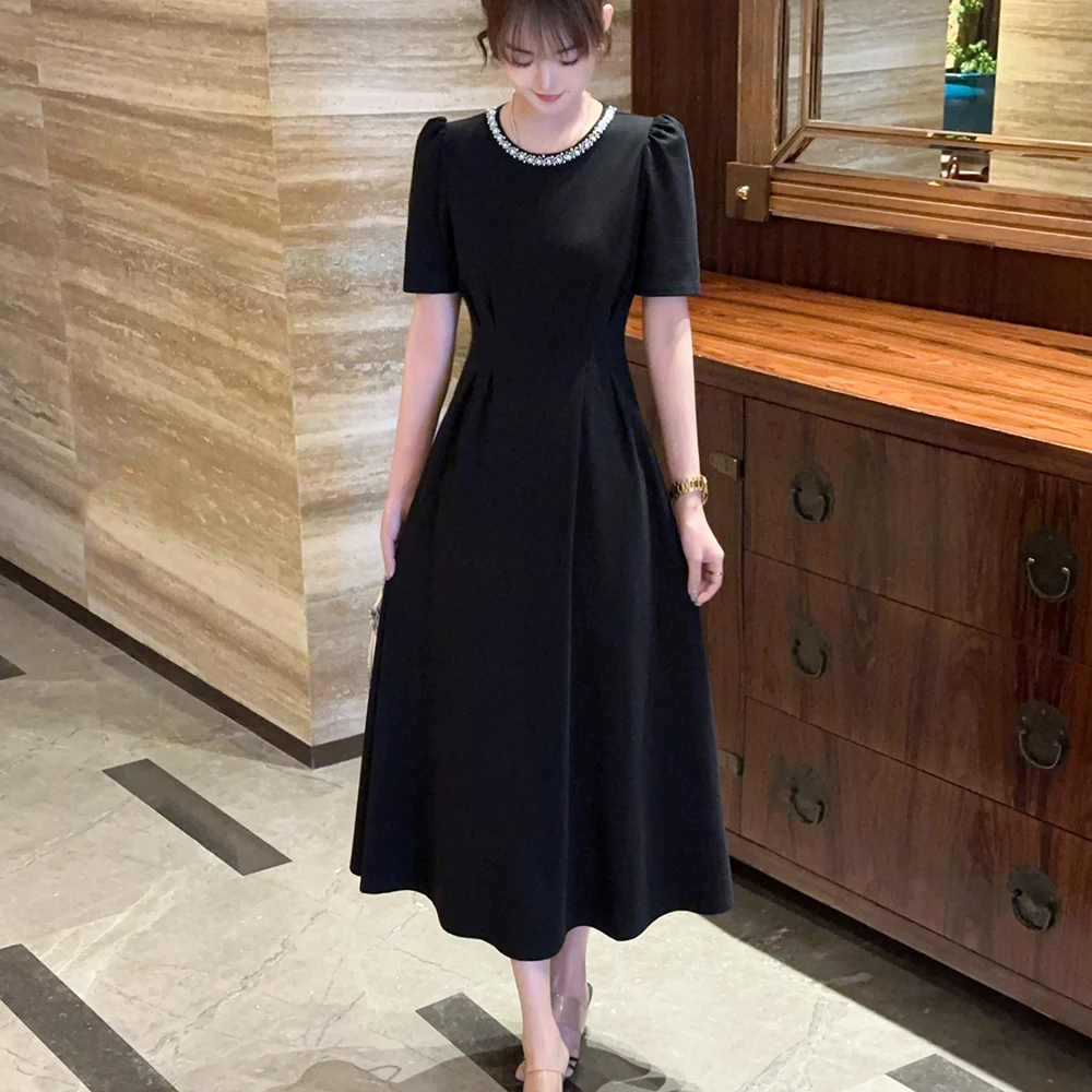 2025年珍珠黑色短袖连衣裙子女新款赫本风小个子a字法式长裙1568