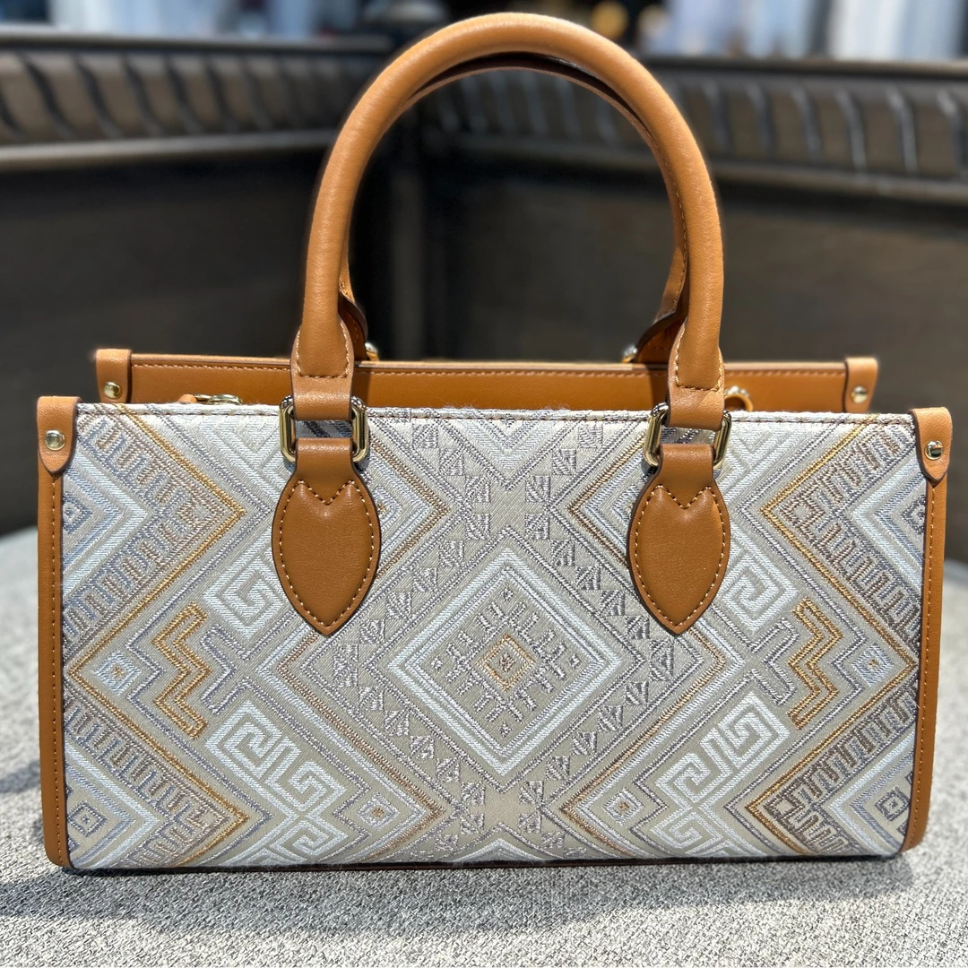 瑞龙华彩手提包轻奢女士手工包休闲时尚百搭编织红色纯手工抽绳