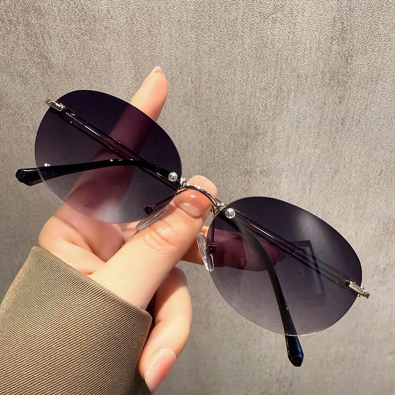 2025款无框切边墨镜女高级感夏季椭圆形眼镜拍照凹造型小脸太阳镜