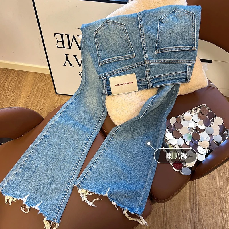 港风毛边微喇牛仔裤女2025春秋新款修身显瘦喇叭裤直筒高腰牛仔裤