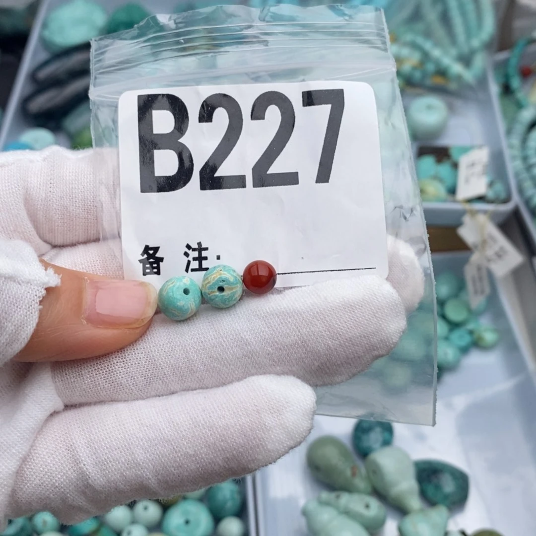 未镶嵌卡7老型一对南红玛瑙羽**尘