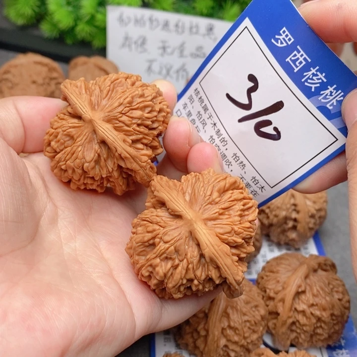 桃核把件44四座楼310号牌