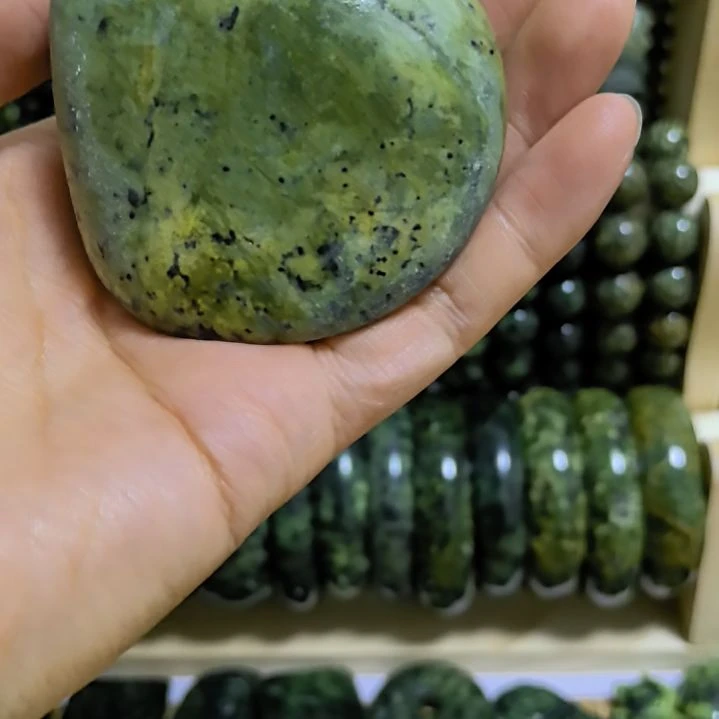 石材一*灯藏玉药王石原石手把件一个
