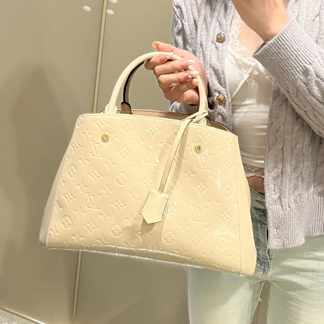 95新 LouisVuitton/路易威登 lv奶黄色蒙田手拎包