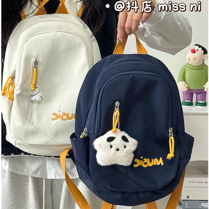 日系纯色字母书包女小清新学院风轻便百搭双肩包学生高颜值背包男