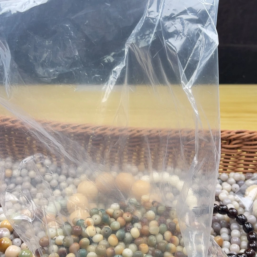 白玉菩提吊坠Z/9mm/100颗微瑕