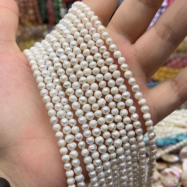 玛瑙/玉髓未镶嵌珠宝半成品一条4mm左右椭圆珍珠有生长纹