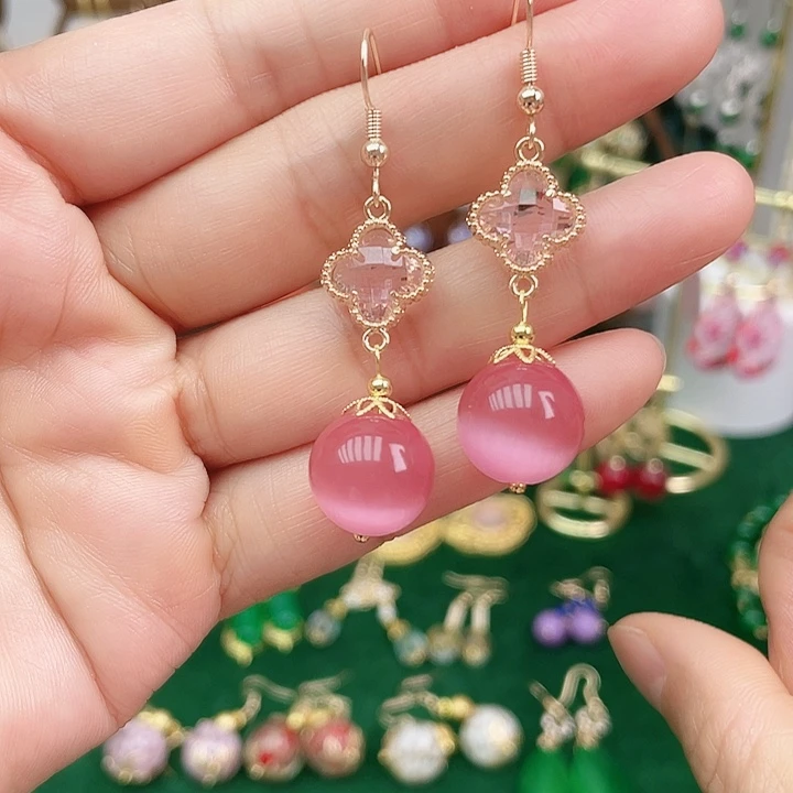 石英质玉合金耳钉粉色猫眼