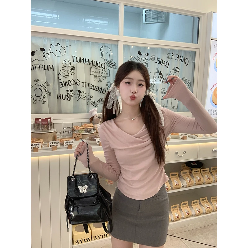 粉色荡领长袖t恤女2025年新款早秋韩系修身纯欲斜领小众显瘦上衣
