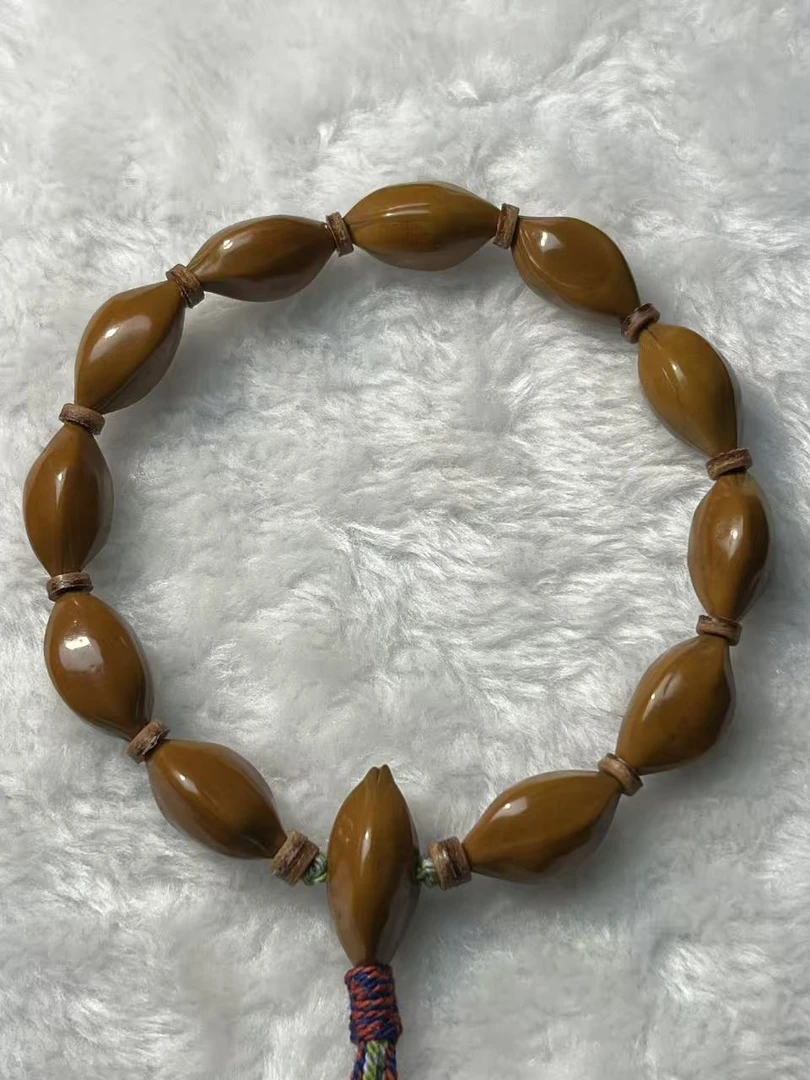 G03玉林古树橄榄三面佛12mm