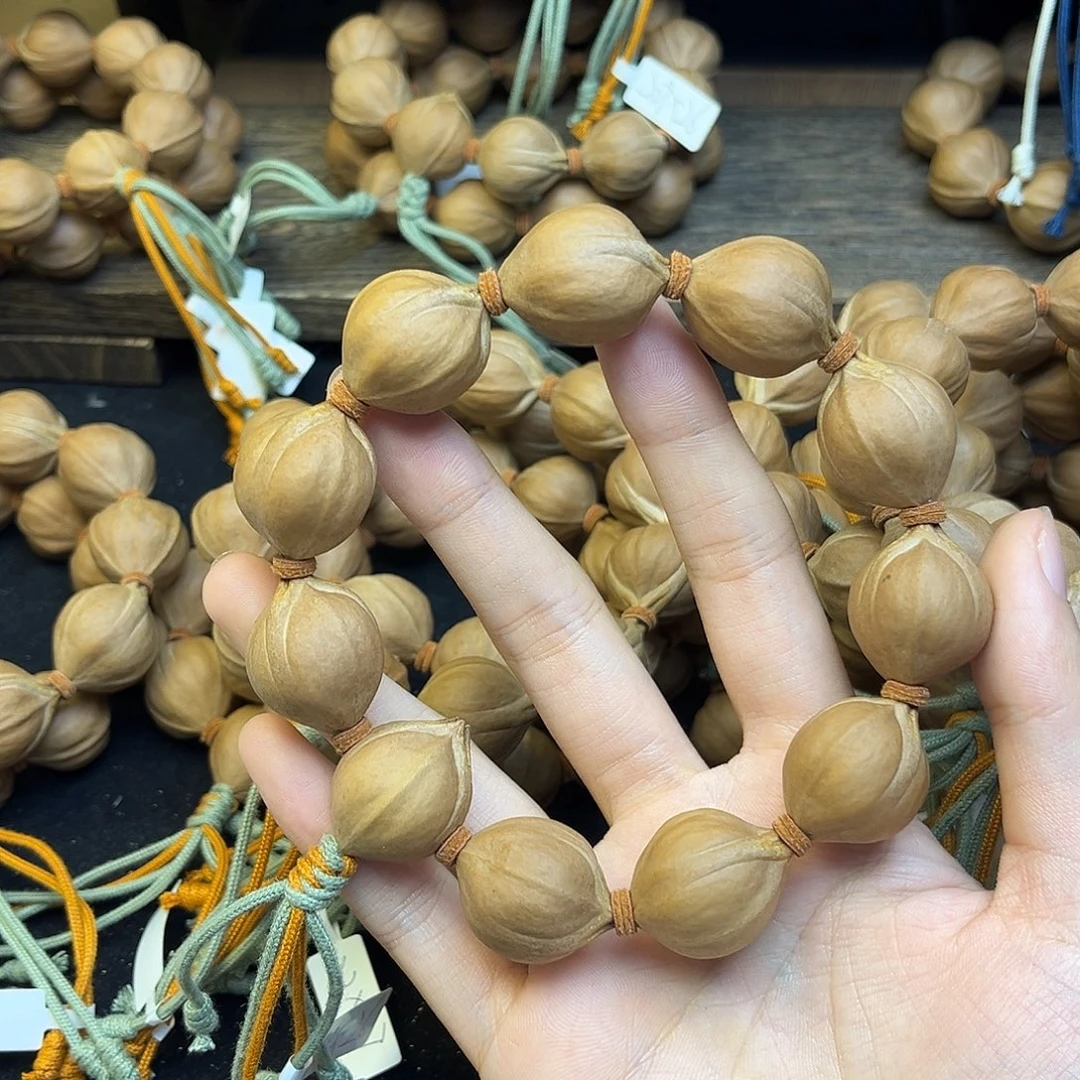 小***房橄榄核手串005 21×26