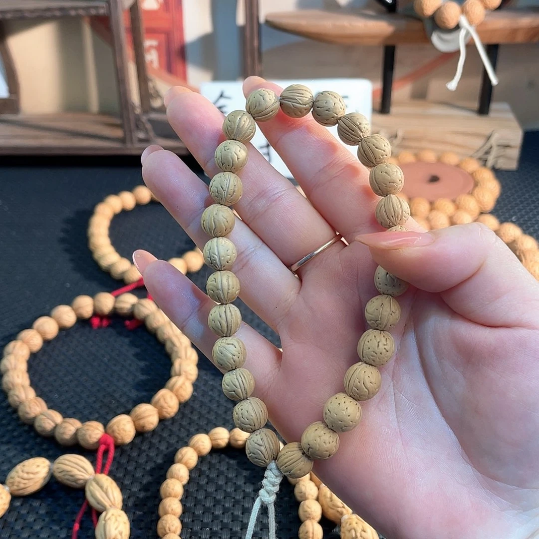 树脂制品谜9加野生桃核单圈手持