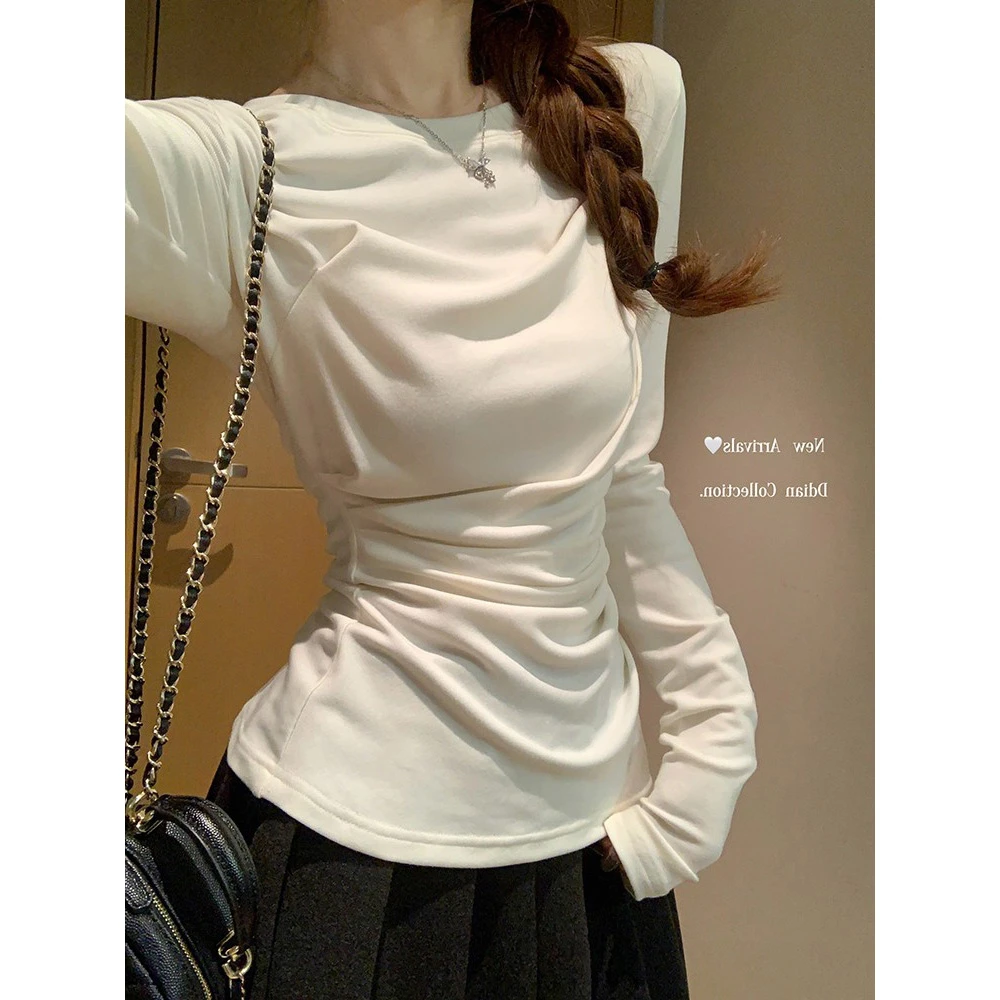 气质不规则辣妹长袖衫秋冬纯欲小众褶皱修身显瘦保暖白色小上衣女