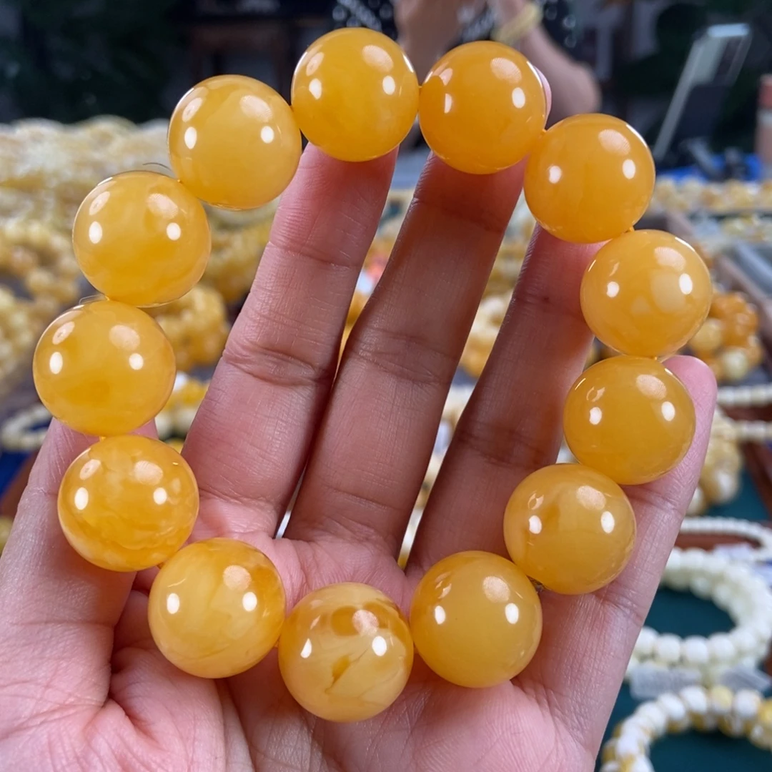 琥珀未镶嵌珠宝奇石18鸡油红圆珠44.19