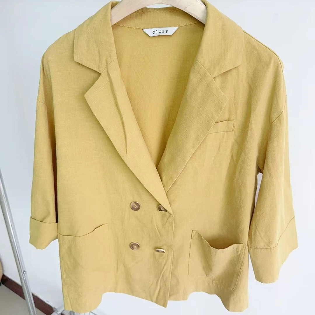 L214 双口袋七分袖薄款西装外套