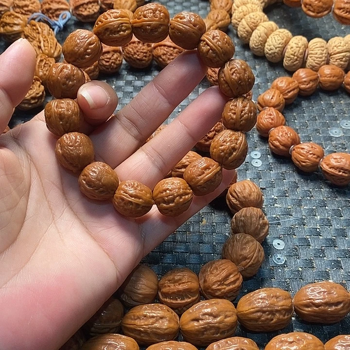 用***2文玩核桃手串金豆子