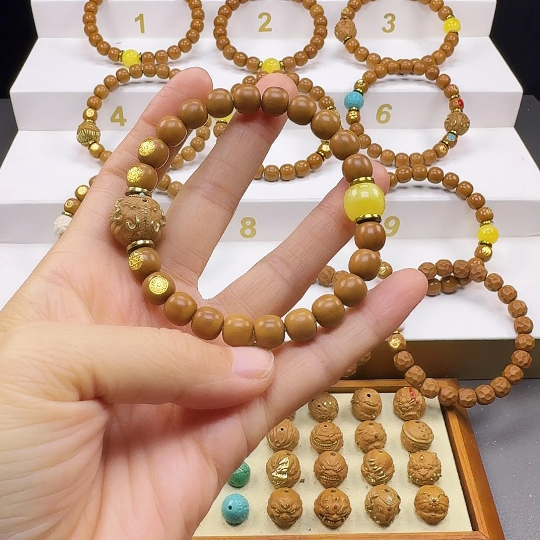 宸***猴头核桃吊坠猴头手串