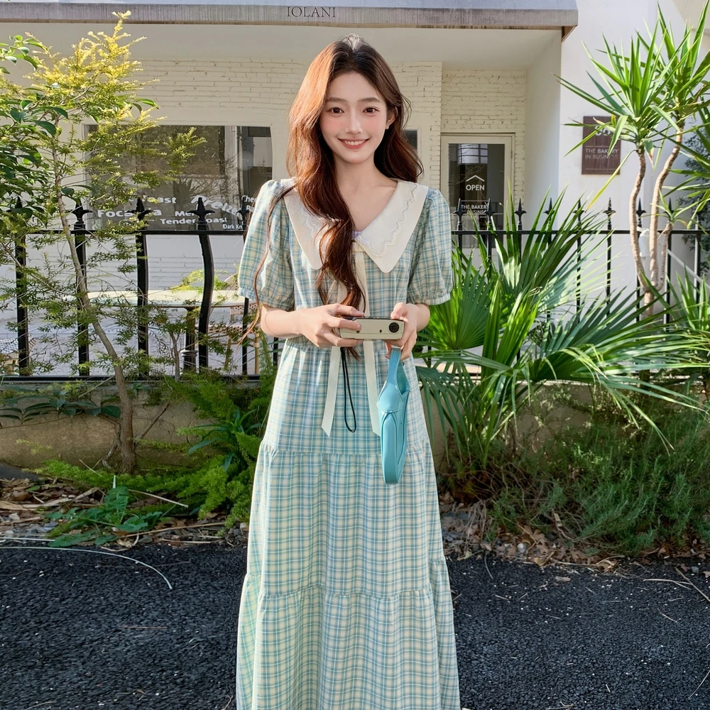 甜美风蓝色格纹连衣裙女夏2025新款超火好看娃娃领泡泡袖收腰长裙