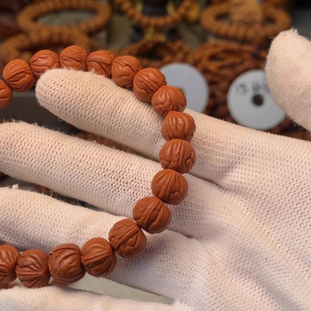 思***棋手串桃核秦岭龙纹
