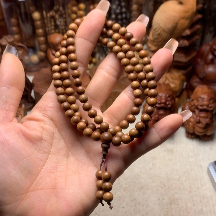 檀香木其他老山檀香手把件瑕疵