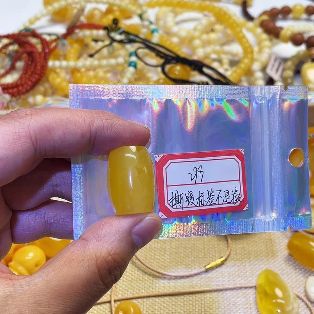 蜜蜡未镶嵌手串桶珠瑕疵