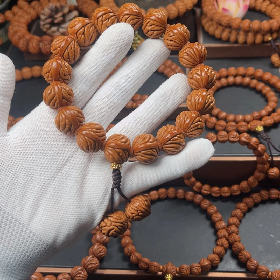 桃核吊坠18祥云手持