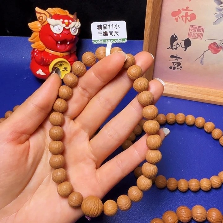 歪***歪吊坠猴头核桃凤羽