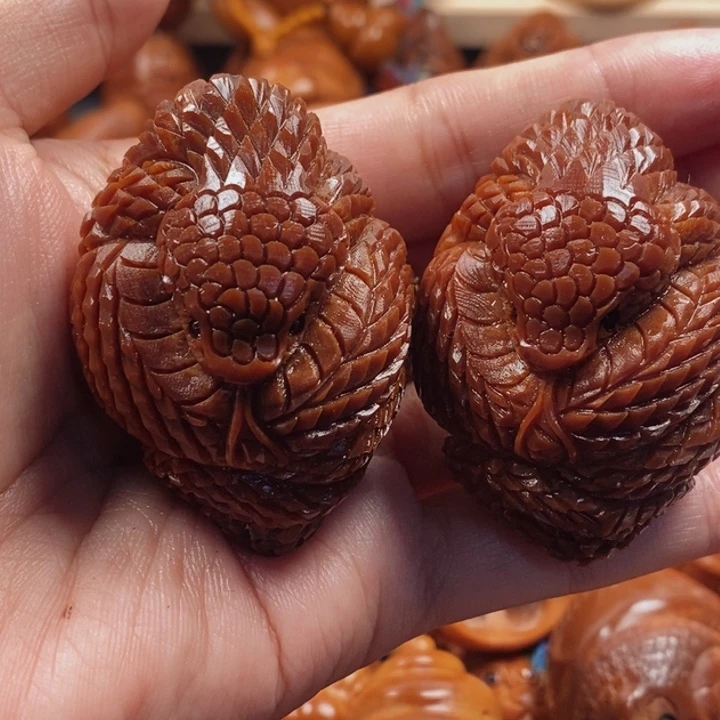 千***来橄榄核手串/手链玉化蛇