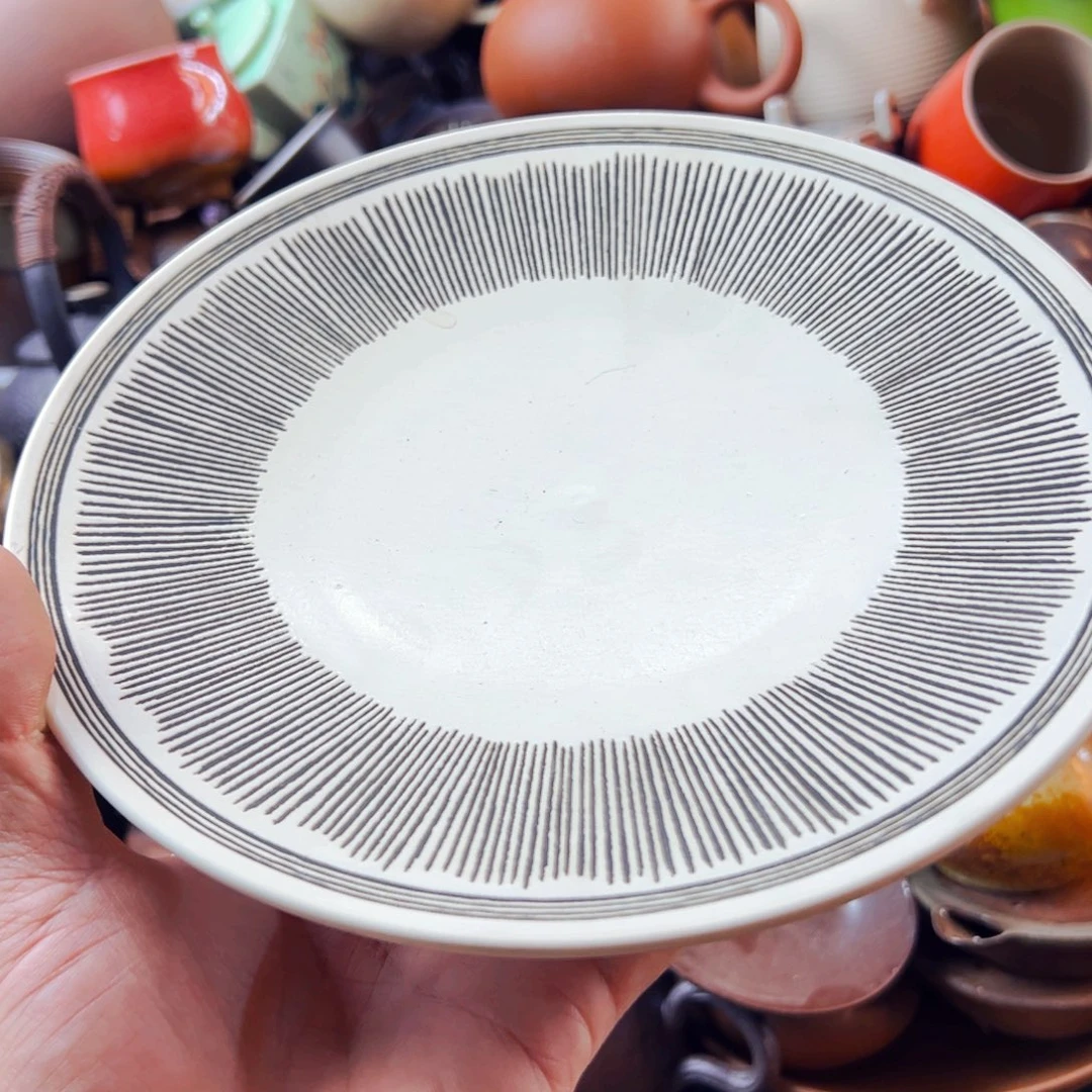 瓷片粗暴又无趣味性与现实生活性之间相互