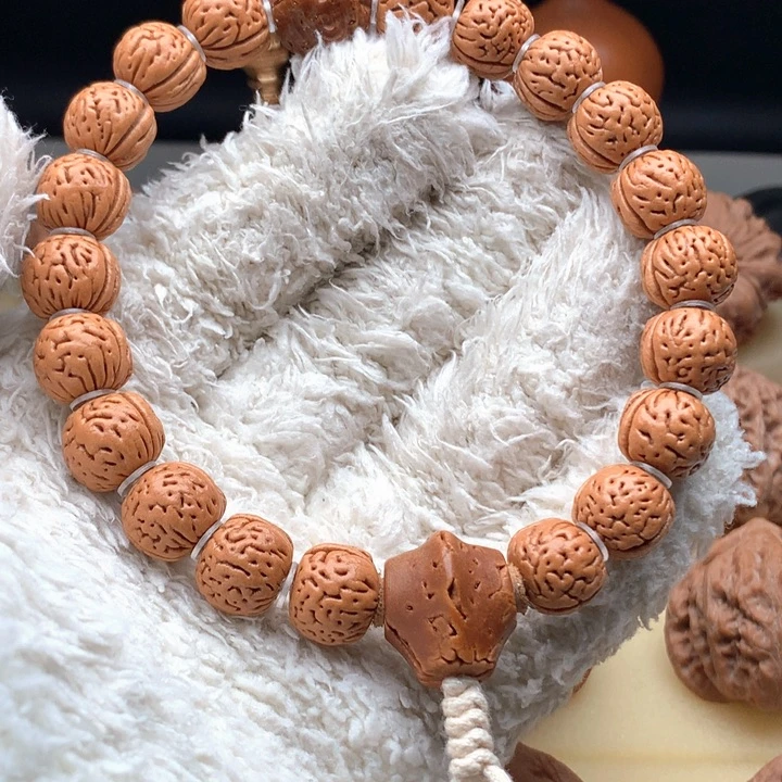 把件文玩核桃玉女脐桃核